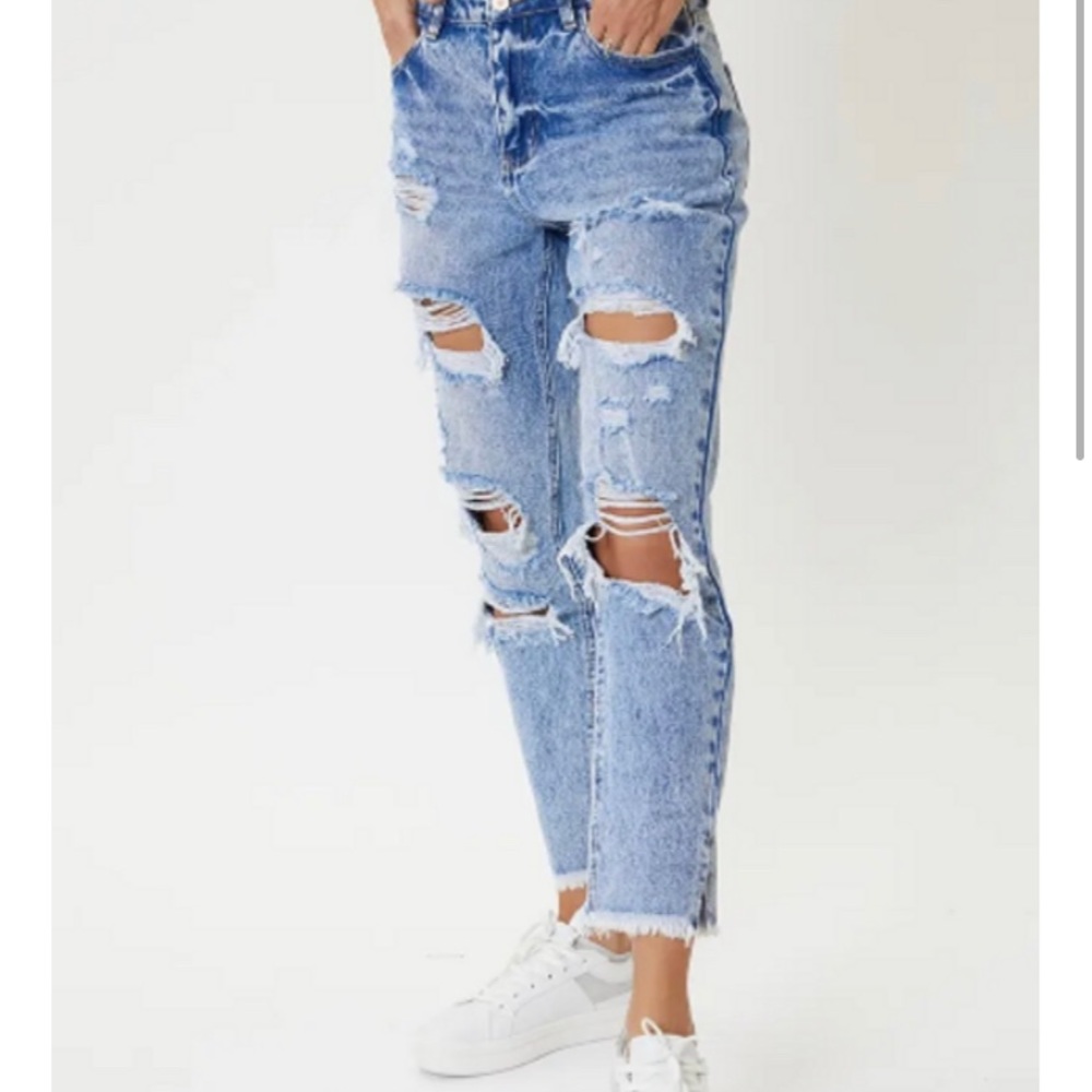 Distressed jeans.